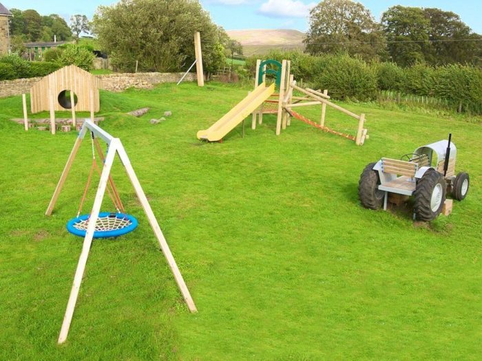 natural, wooden parish council playground equipment