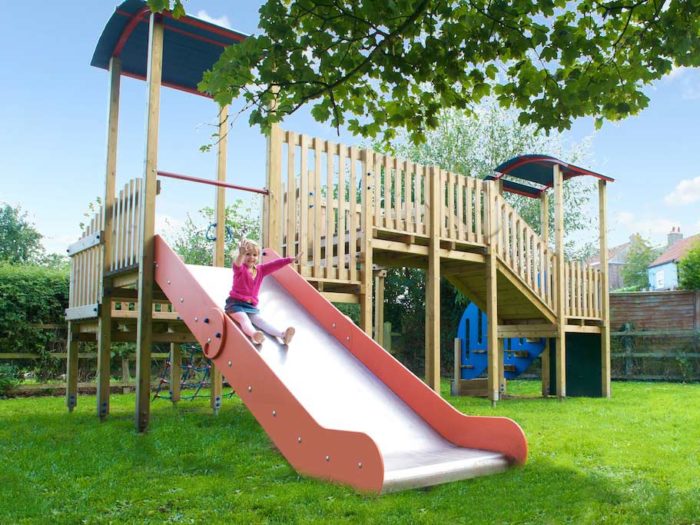 girl using Pickhill Parish council playground slide